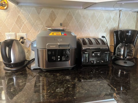 Air fryer/ quick cooker, electric teapot, coffee, trip, pot, and toaster. 