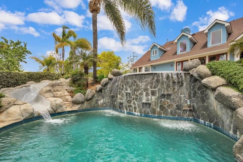 Dip into the lower pool from the waterslide!