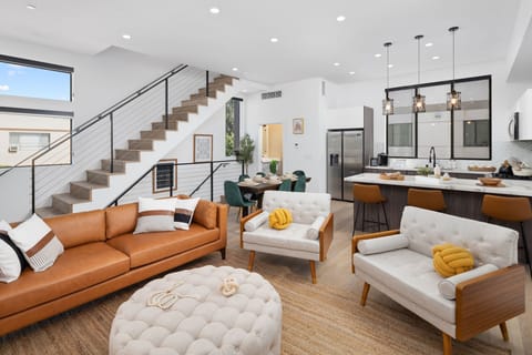 Open living area with gourmet kitchen on the second floor 