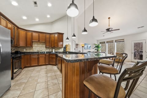 Kitchen with bar top seating