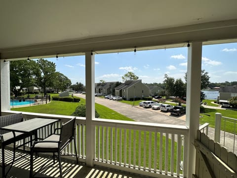 Beautiful lake view and pool for you to enjoy which includes outdoor bathroom