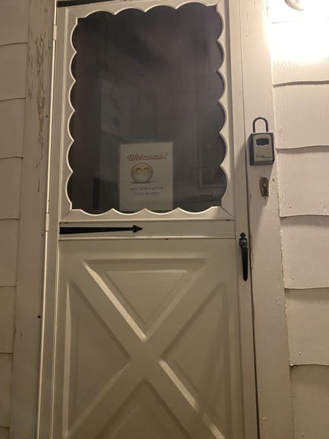 Entrance to Vrbo unit with lock box on right side wall