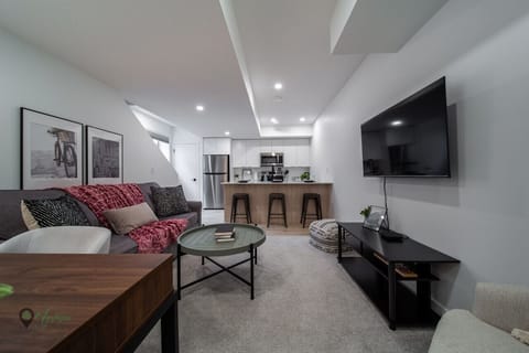 Living room with 55` Smart TV and pull out sofa