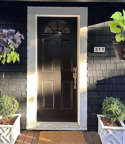 Charming entrance. Well lit and right next to parking spot for easy access.