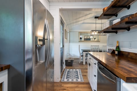 The kitchen sits just off the front door