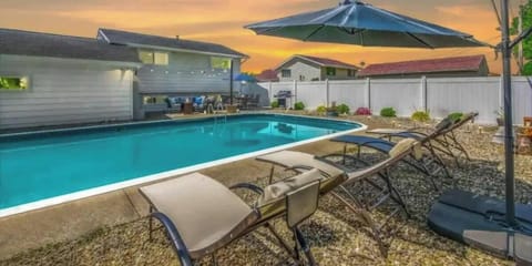 - Refresh in the sparkling outdoor swimming pool at sunset   - Relax on poolside loungers with umbrella shade and seating   - Seasonal pool available May 15 to September 29 weather permitting  