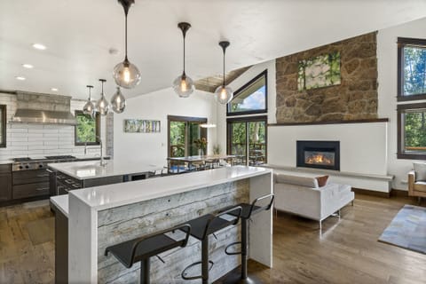 Open concept modern kitchen with bar