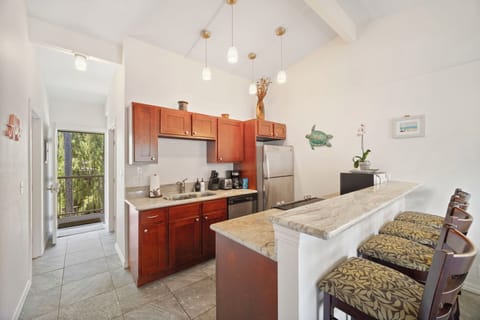 Fully stocked kitchen and bar top for dining in