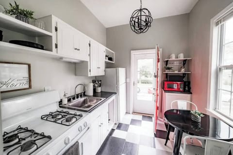 Full kitchen. On street parking in front of the private entrance.