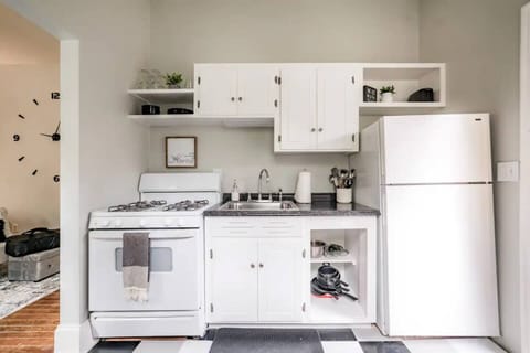 Full kitchen includes gas stove, oven, microwave, sink, dishware, pots/pans, and everything you need for cooking basic meals.