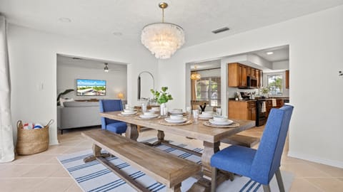 Share meals and moments at a beautiful dining table with cozy seating for up to eight guests.