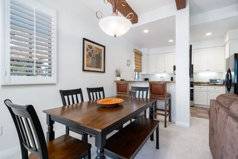Dining area. Seating for 6 at the table. 2 barstools for additional seating.