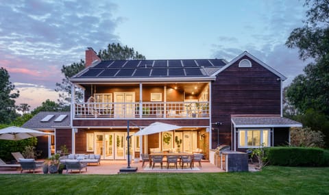 Single family home with large private yard and outdoor seating and dining