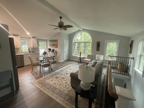 Open space to enjoy all the views of the tree lined backyard.