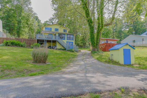 The two houses are located directly beside each other. 