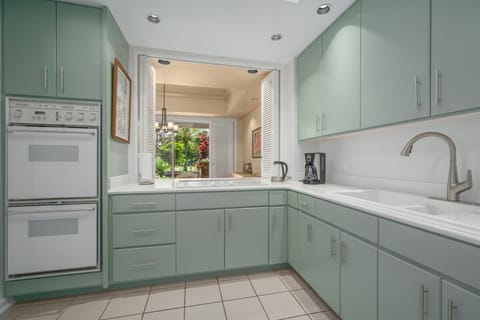 The kitchen has a pass through window to the dining room.  You can see the garden while cooking.