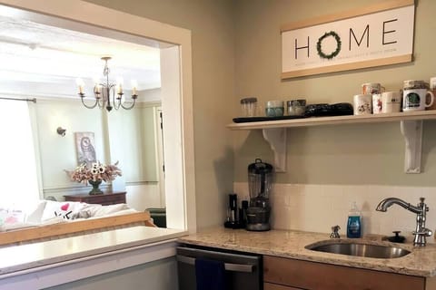 Pass through kitchen makes a great breakfast and coffee bar.