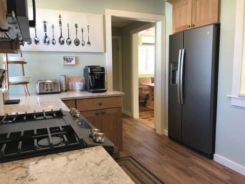 New kitchen on the first floor with laundry down the hall.
