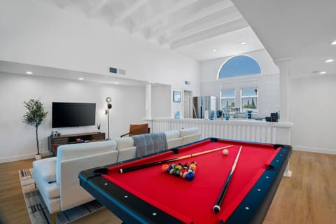 Pool table awaits for fun nights.