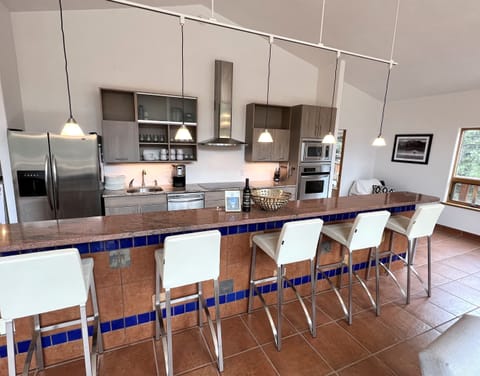 Cook amazing meals or just chat it up with the chef while they do, this kitchen and bar are waiting for your creations