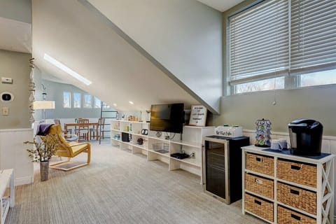 Living Room off the kitchen with coffee station, beverage cooler, Smart TV
