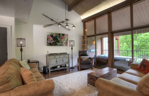 Living Room with Comfortable Furniture, Modern Mountain Decor, and Smart TV