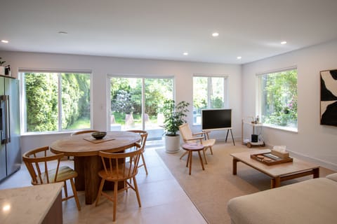 Living space featuring record player and frame tv