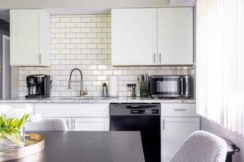 Prepare your favorite meals in this tidy and pristine kitchen