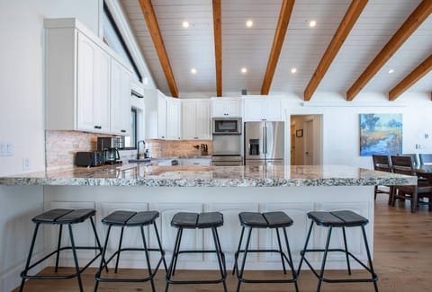 Open and bright kitchen with extra seating options