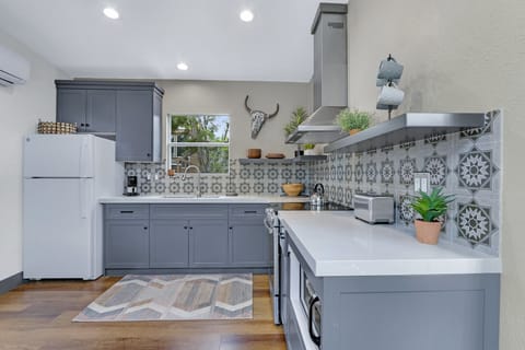 Closer view of kitchen.