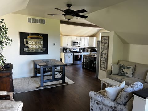 Living & Dining Room - with a swivel 50” smart TV & fireplace for ambient lights