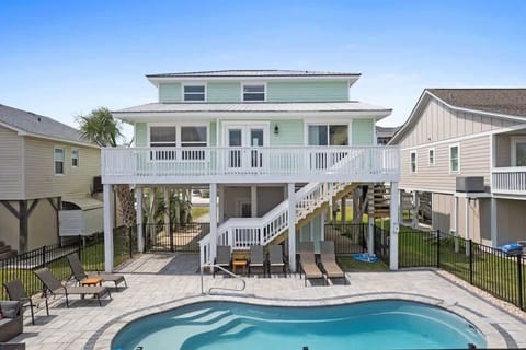 Dive into relaxation by the pool with stunning views of Ocean Isle Beach!