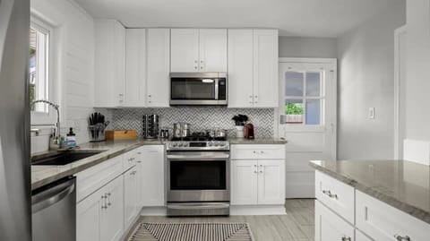 Whip up delicious meals in this fully equipped kitchen!