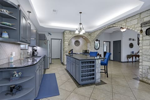 Looking left from the entry door you see the kitchen and bar area.