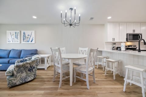 Dining Room offers a table for 4 & extra seating at the bar.
