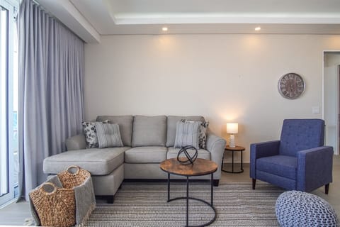 Muted colors greet you on the living room