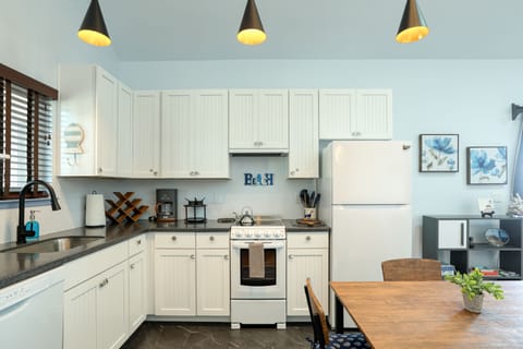 Beach house convenience with a kitchen that puts everything at your fingertips.