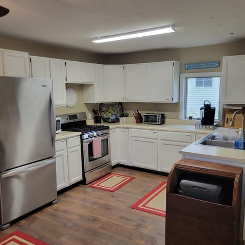 Propane gas oven, microwave and full-size refrigerator