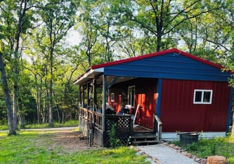 This tiny cabin sits in the middle of 10 wooden acres