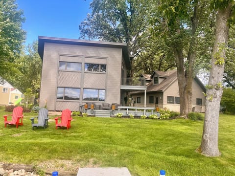 Enjoy a large, flat .66 acres lot full of landscaping and mature trees. 