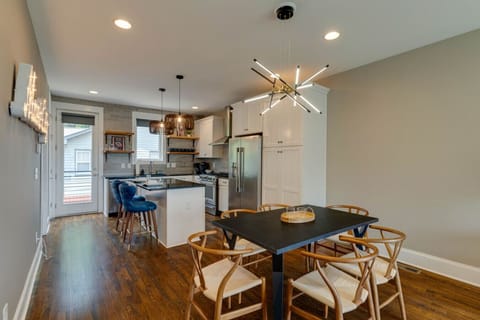 Open dining area adjacent to the kitchen, ideal for family meals or entertaining guests