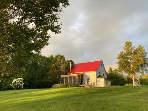 View of the house from the bottom of the hill
