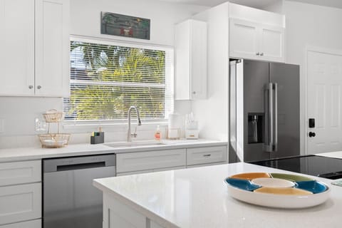 Cook, chat, and create—this kitchen is as beautiful as it is practical. Everything you need to whip up your favorite meals while on vacation.