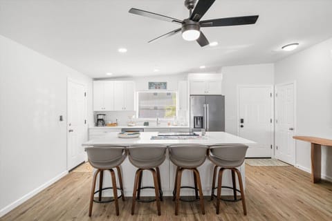 Cook, chat, and create—this kitchen is as beautiful as it is practical. Everything you need to whip up your favorite meals while on vacation.