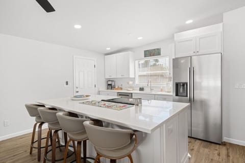 Cook, chat, and create—this kitchen is as beautiful as it is practical. Everything you need to whip up your favorite meals while on vacation.