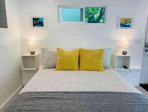 Comfortable queen size bed with new mattress.