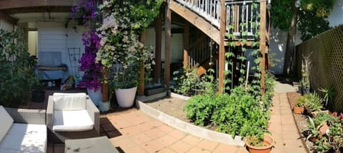 View from shared backyard. Note that foliage may not be full depending on season