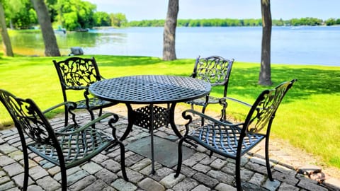 Patio table chairs and umbrella.