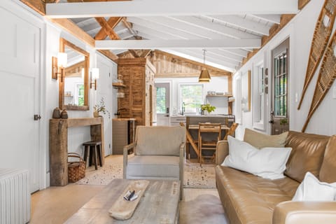 Open-concept floor plan with natural light flooding in throughout.