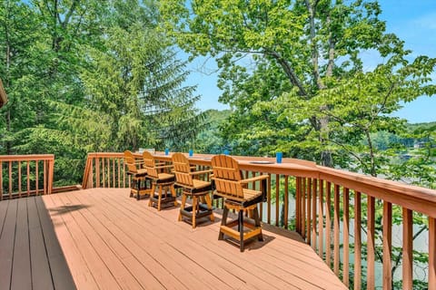 Broad deck featuring extensive seating, providing an ideal spot for socializing and savoring the open air.